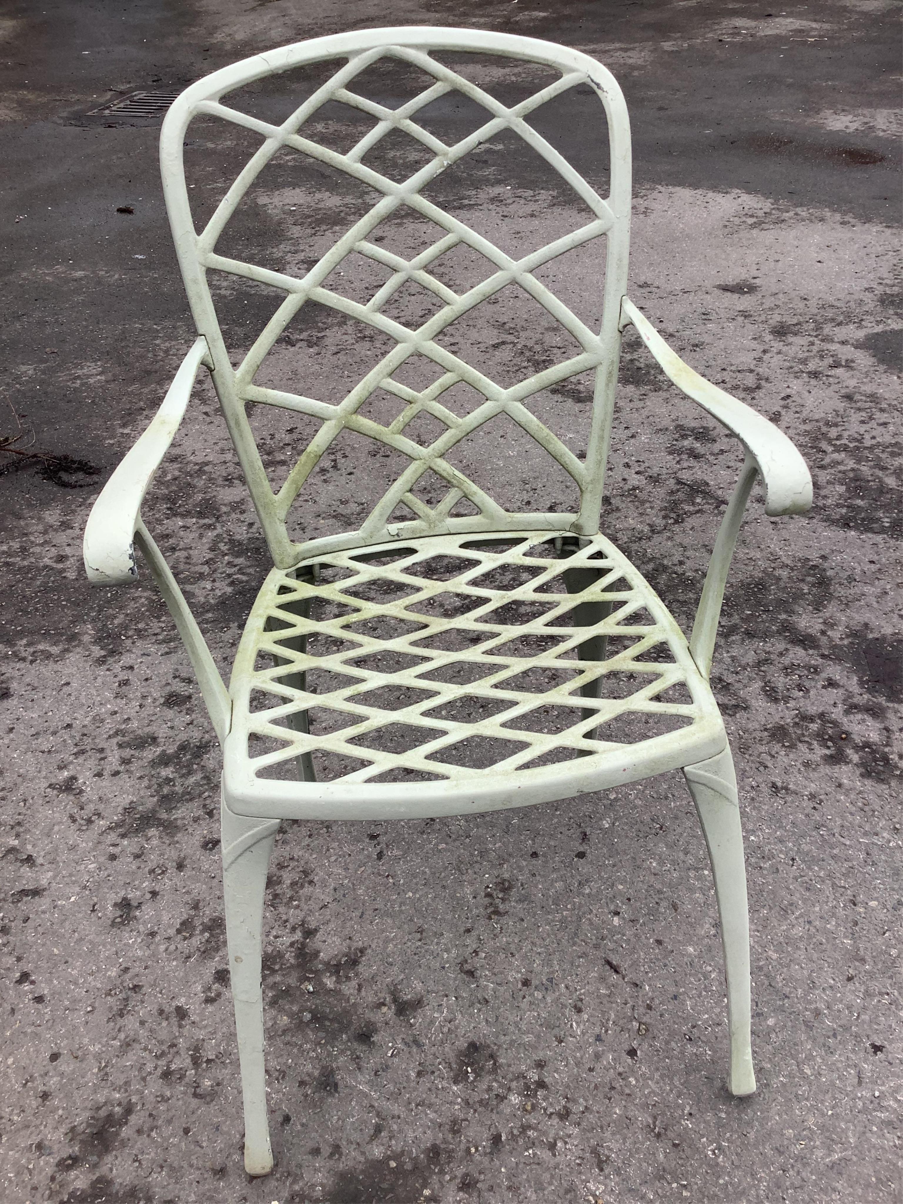 A set of four painted aluminium garden chairs, width 55cm, height 92cm. Condition - fair